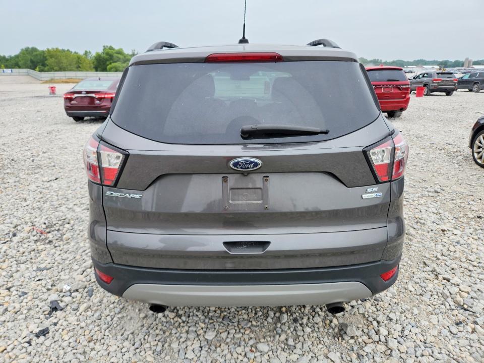 Photo 6 from auction – 2018 FORD ESCAPE with VIN 1FMCU9GD0JUB71030