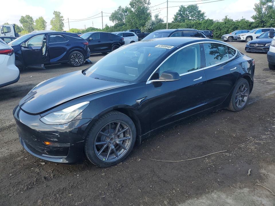 TESLA MODEL 3 2018 with VIN 5YJ3E1EA2JF171468 - Photo from auction