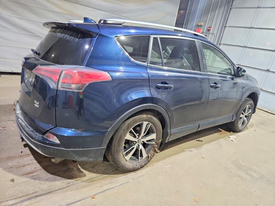 Photo 3 from auction – 2017 TOYOTA RAV4 with VIN JTMRFREV8HJ702507