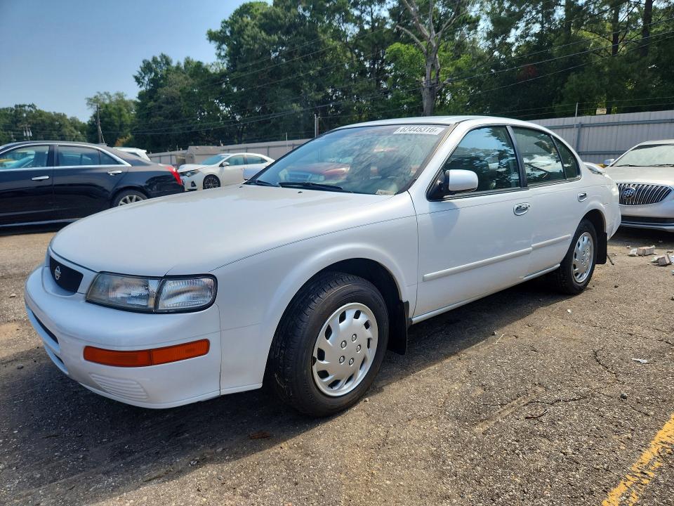 NISSAN MAXIMA 1996 with VIN JN1CA21D9TT136740 - Photo from auction