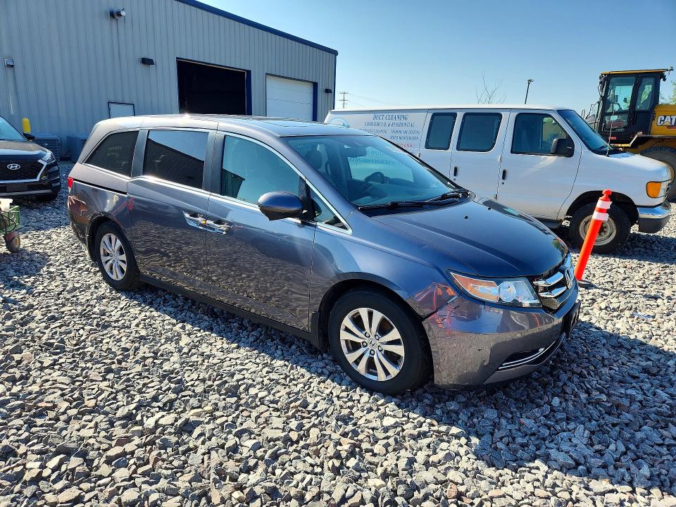 Photo 4 from auction – 2014 HONDA ODYSSEY with VIN 5FNRL5H62EB075280