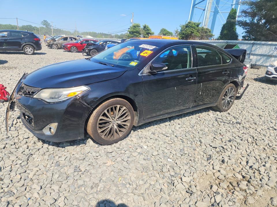 TOYOTA AVALON 2015 with VIN 4T1BK1EB4FU160110 - Photo from auction