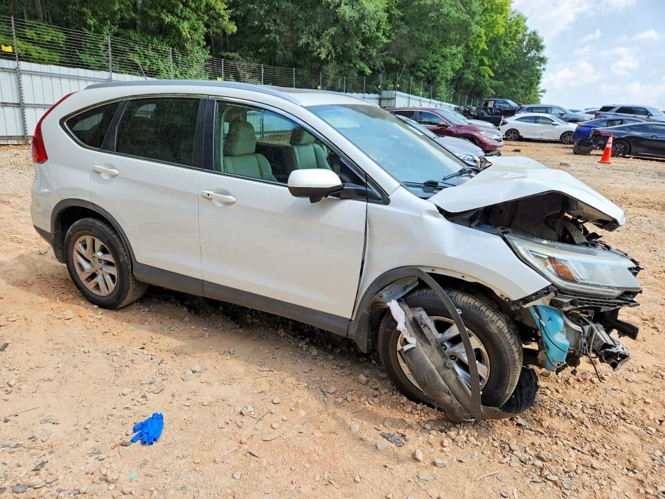 Photo 4 from auction – 2016 HONDA CR-V with VIN 5J6RM4H71GL114967