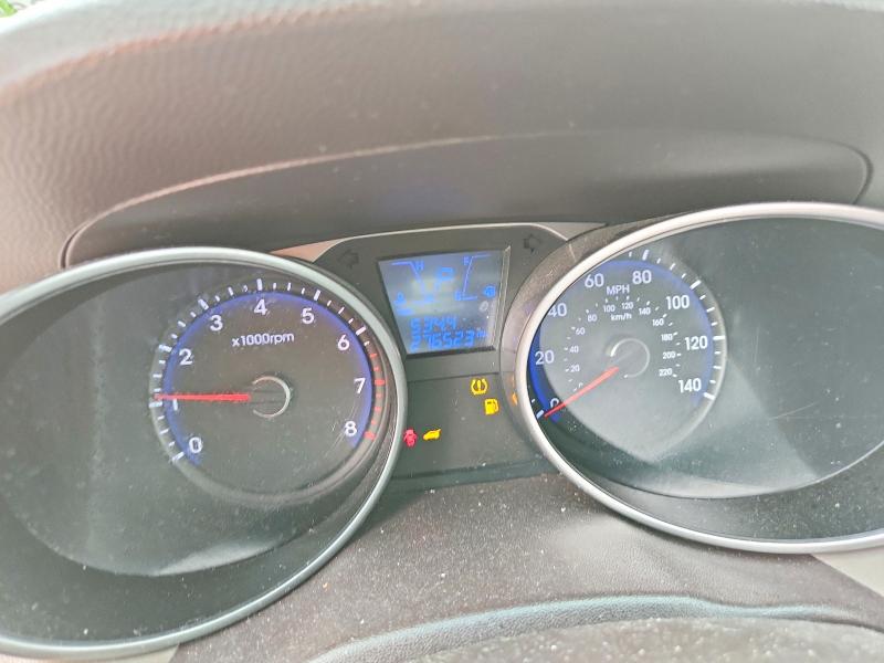 Photo 9 from auction – 2011 HYUNDAI TUCSON with VIN KM8JU3AC8BU143093