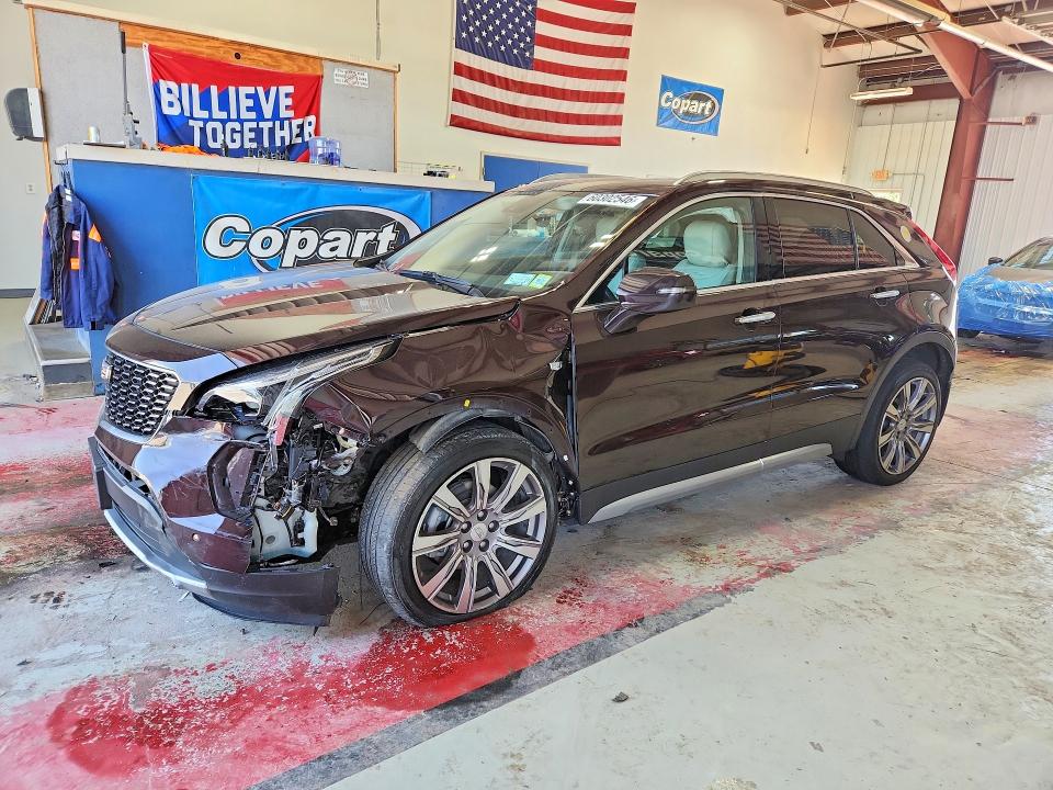 CADILLAC XT4 2021 with VIN 1GYFZDR40MF055834 - Photo from auction