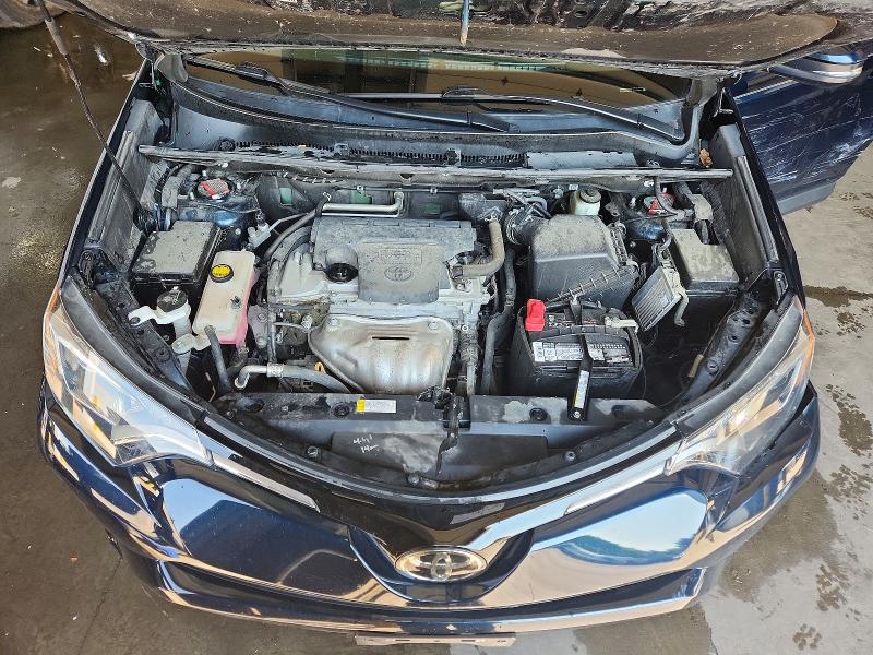 Photo 11 from auction – 2018 TOYOTA RAV4 with VIN 2T3RFREV6JW815783