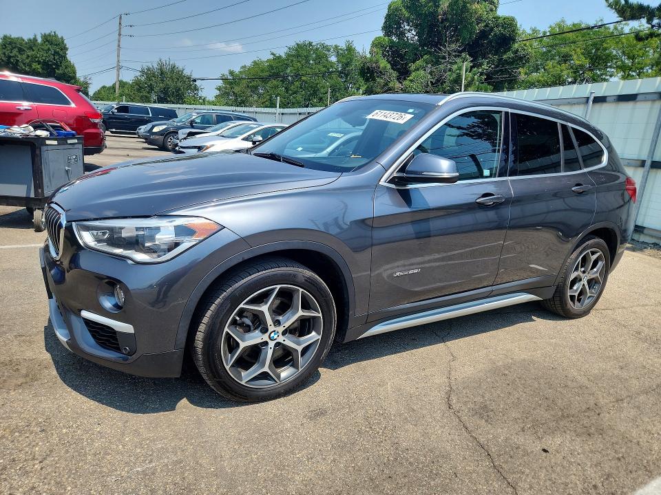 BMW X1 2018 with VIN WBXHT3C30J5K25396 - Photo from auction