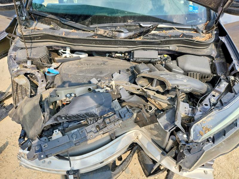 Photo 12 from auction – 2021 HONDA PASSPORT with VIN 5FNYF7H57MB005486