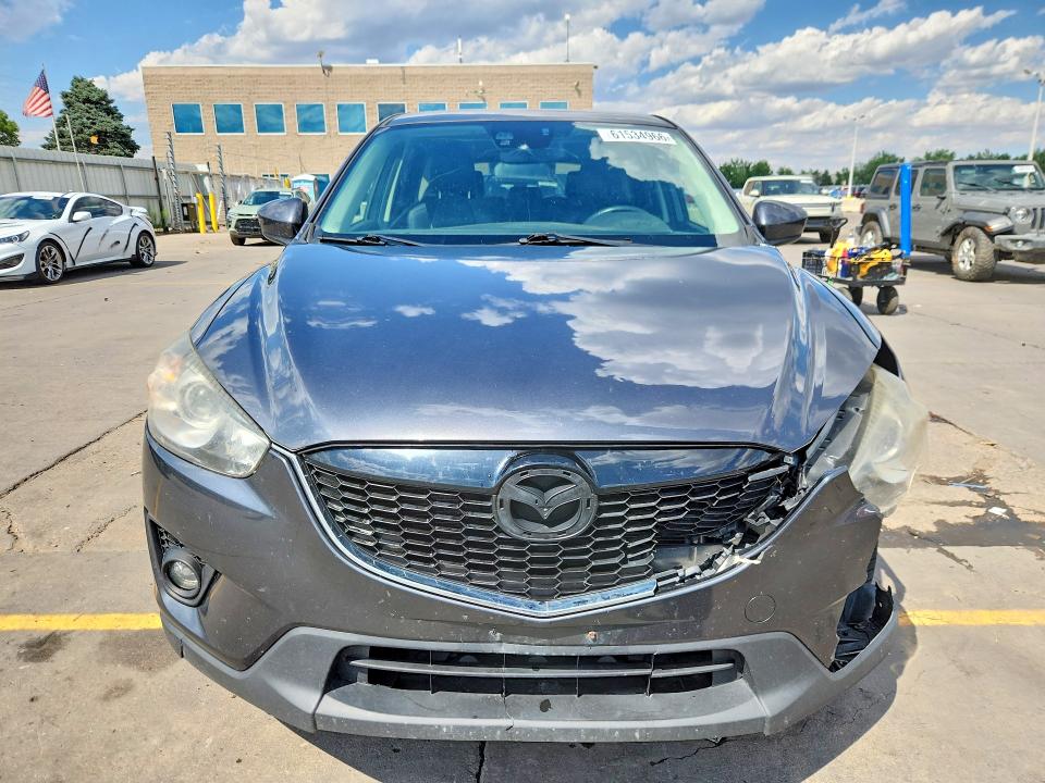 Снимка 5 от търг – 2014 MAZDA CX-5 с VIN JM3KE4DY8E0300854