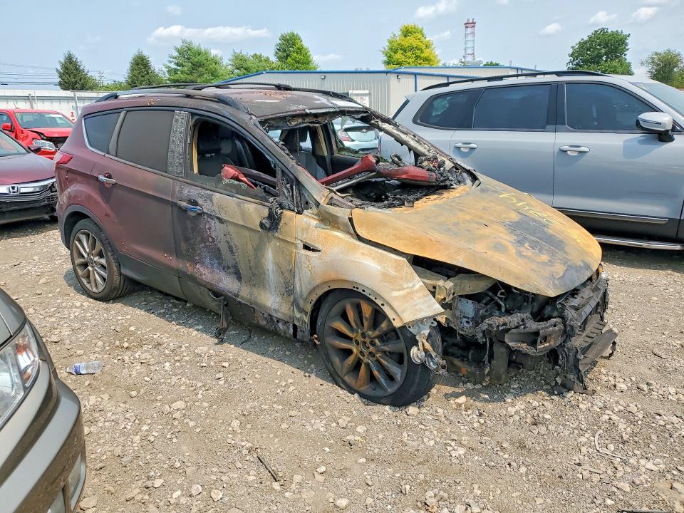 Photo 4 from auction – 2016 FORD ESCAPE with VIN 1FMCU9GX5GUA25483