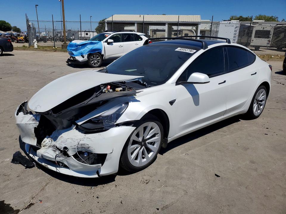TESLA MODEL 3 2023 with VIN 5YJ3E1EB7PF706912 - Photo from auction