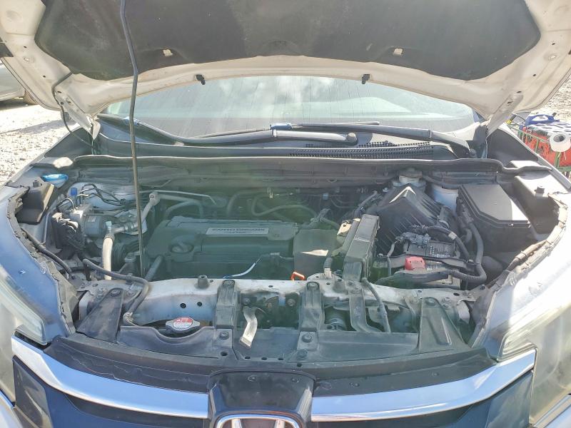 Photo 11 from auction – 2015 HONDA CR-V with VIN 5J6RM4H79FL091629