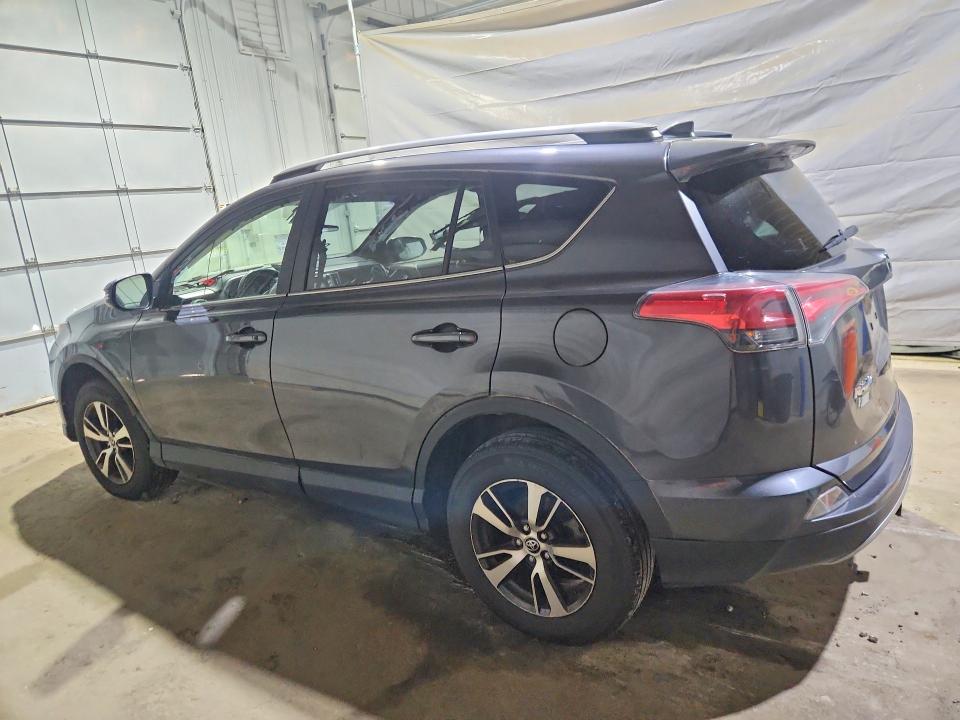 Photo 2 from auction – 2018 TOYOTA RAV4 with VIN JTMRFREV4JJ735820