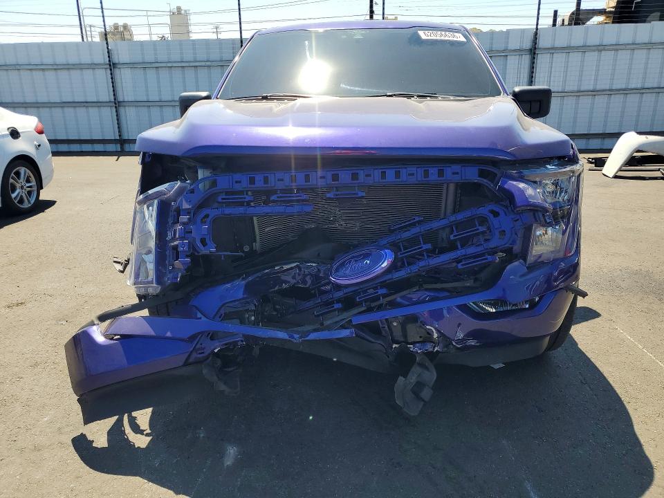 Photo 5 from auction – 2022 FORD F150 with VIN 1FTMF1E55NKD26446