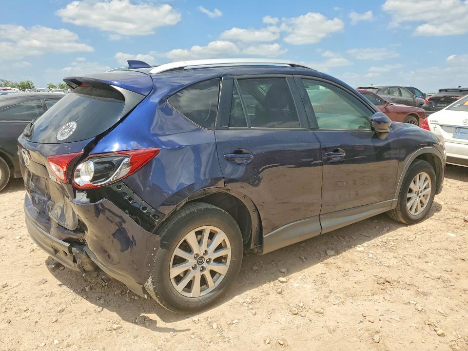 Photo 3 from auction – 2014 MAZDA CX-5 with VIN JM3KE2CY0E0378065