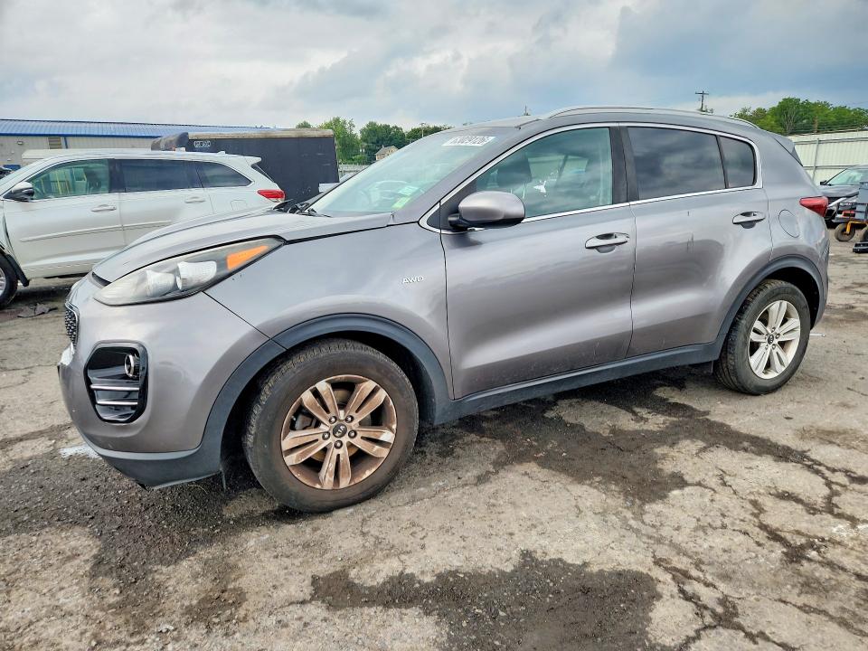 KIA SPORTAGE 2017 with VIN KNDPMCAC6H7035027 - Photo from auction