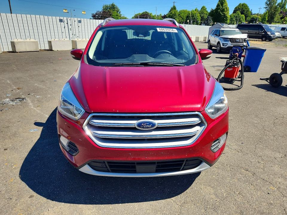 Photo 5 from auction – 2018 FORD ESCAPE with VIN 1FMCU0J95JUA04792
