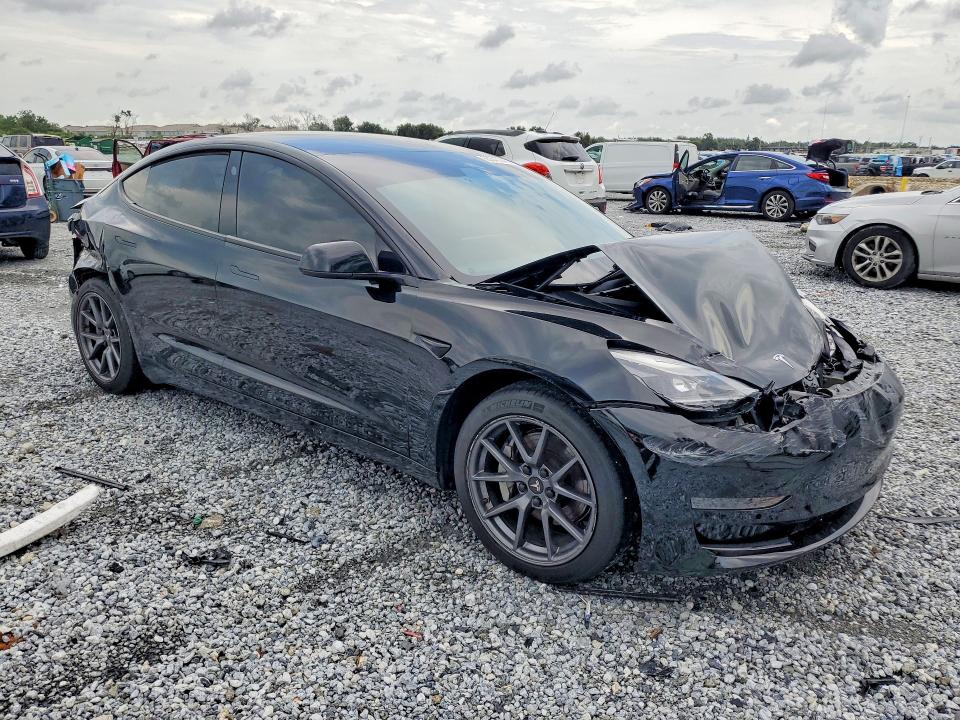 Photo 4 from auction – 2021 TESLA MODEL 3 with VIN 5YJ3E1EA3MF919598