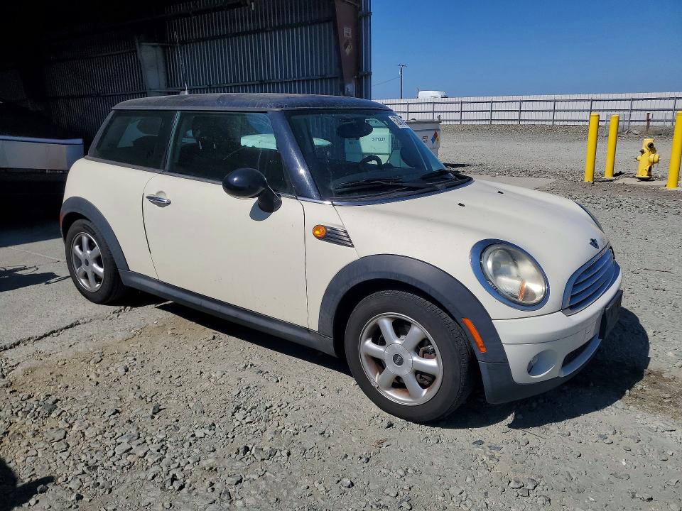 Photo 4 from auction – 2009 MINI COOPER with VIN WMWMF335X9TU75740