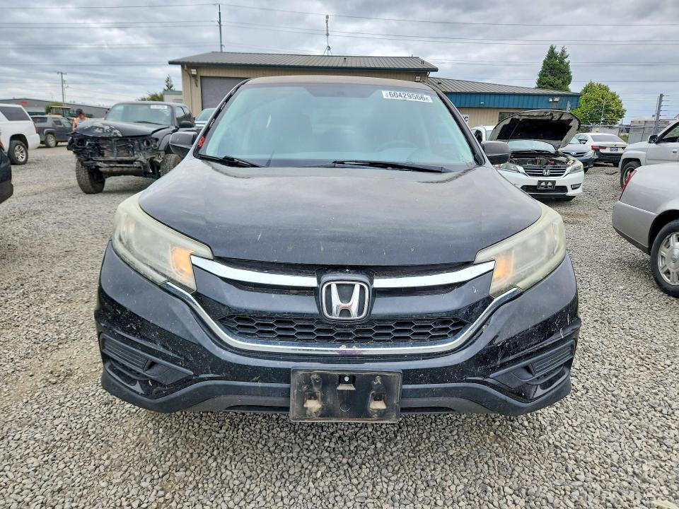 Photo 5 from auction – 2016 HONDA CR-V with VIN 2HKRM4H46GH640575