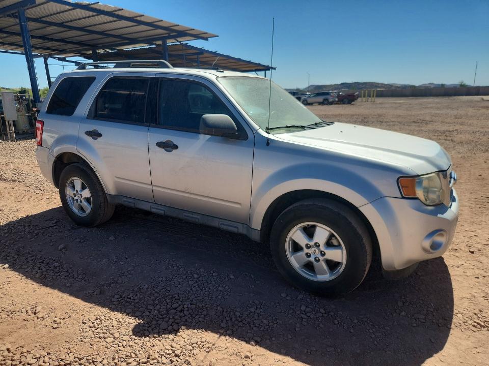 Photo 4 from auction – 2010 FORD ESCAPE with VIN 1FMCU0D76AKA87686