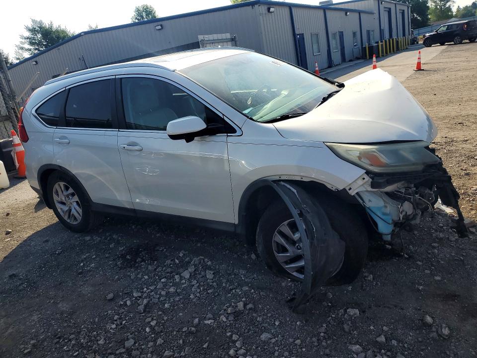 Photo 4 from auction – 2015 HONDA CR-V with VIN 5J6RM4H70FL069468
