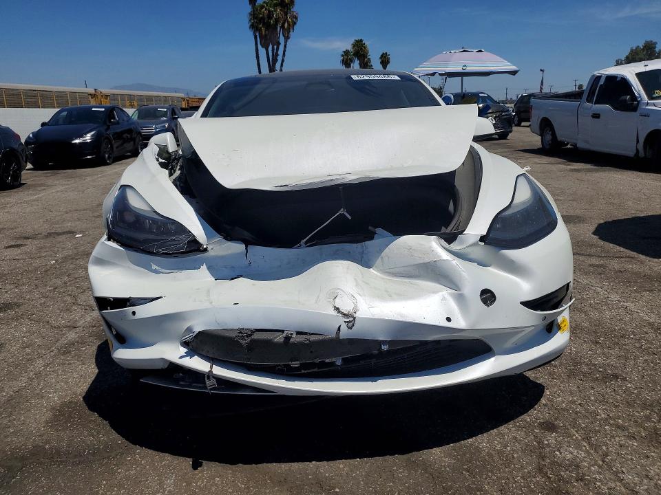 Photo 5 from auction – 2022 TESLA MODEL 3 with VIN 5YJ3E1EB9NF325978