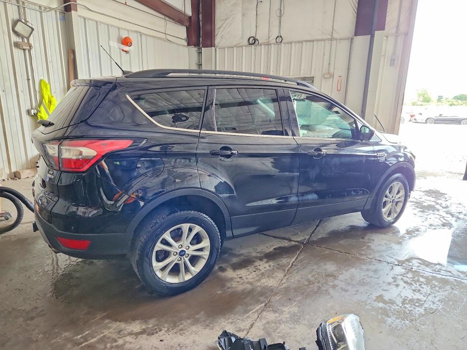 Photo 3 from auction – 2017 FORD ESCAPE with VIN 1FMCU9G94HUE52270