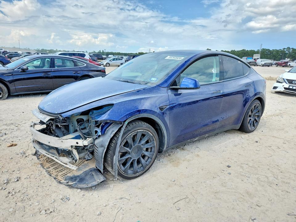 TESLA MODEL Y 2021 with VIN 5YJYGAEE8MF187648 - Photo from auction