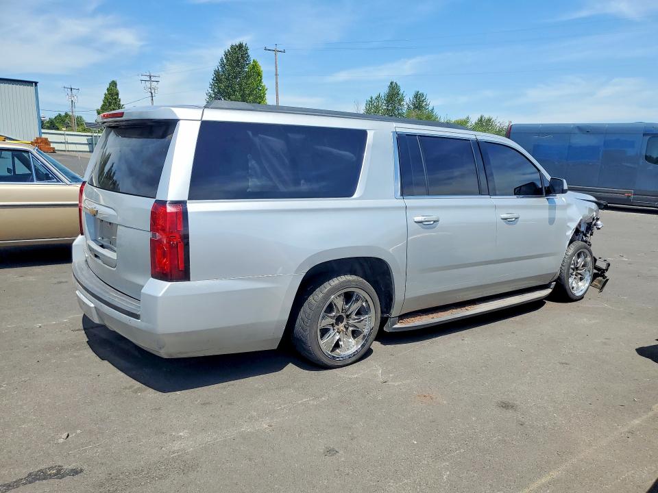 Photo 3 from auction – 2015 CHEVROLET SUBURBAN with VIN 1GNSKJKC5FR692980