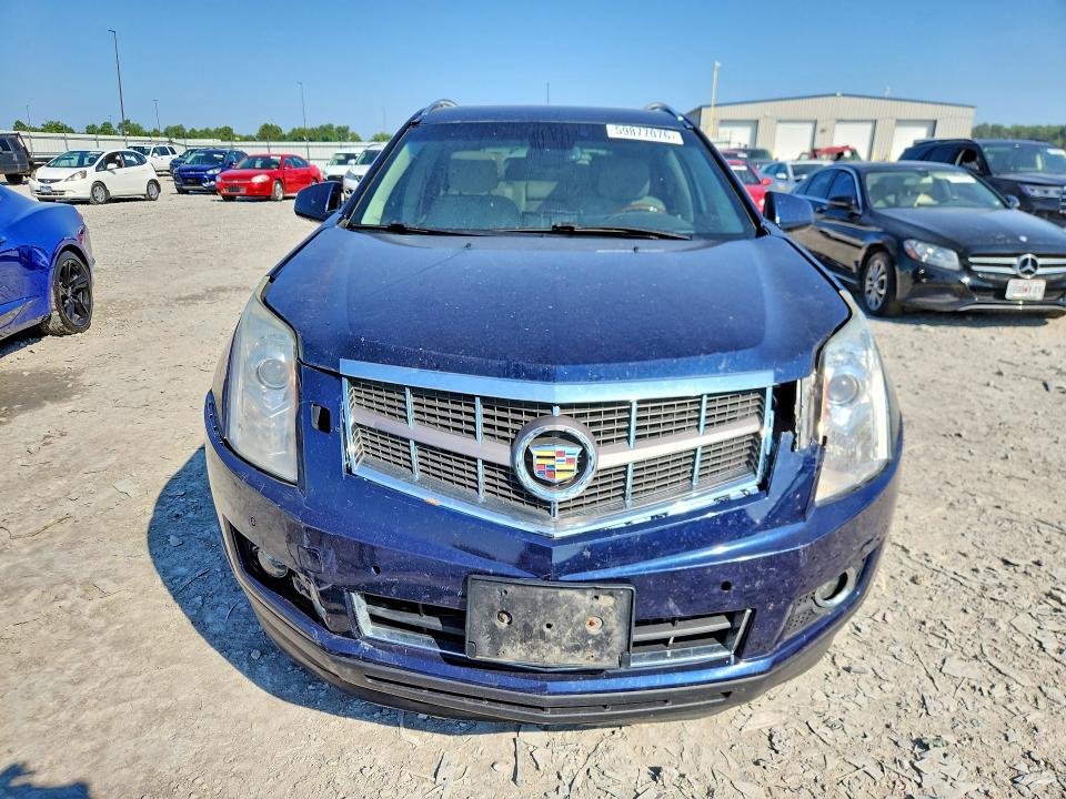 Photo 5 from auction – 2011 CADILLAC SRX with VIN 3GYFNBEY0BS569930