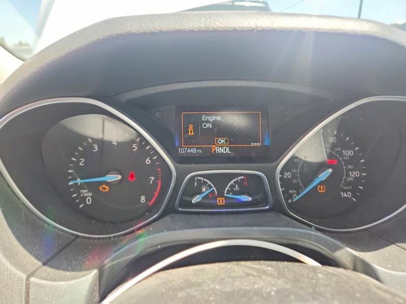 Photo 9 from auction – 2015 FORD FOCUS with VIN 1FADP3F22FL220521