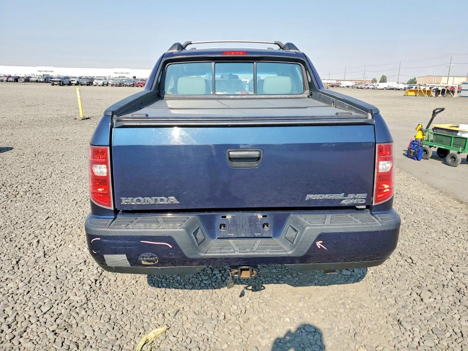 Photo 6 from auction – 2011 HONDA RIDGELINE with VIN 5FPYK1F2XBB005035