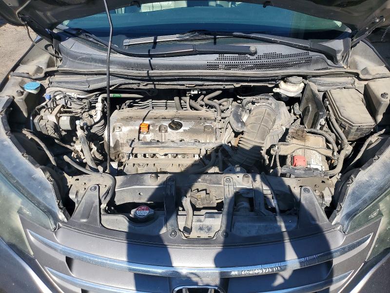 Photo 12 from auction – 2014 HONDA CR-V with VIN 5J6RM4H70EL106209