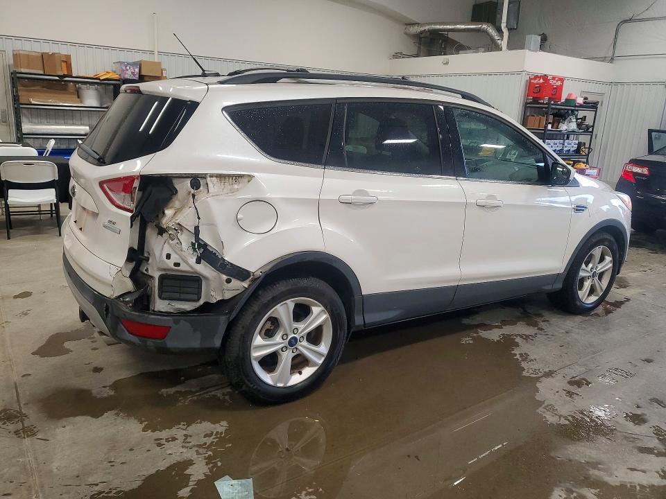 Photo 3 from auction – 2016 FORD ESCAPE with VIN 1FMCU0GX5GUB29984