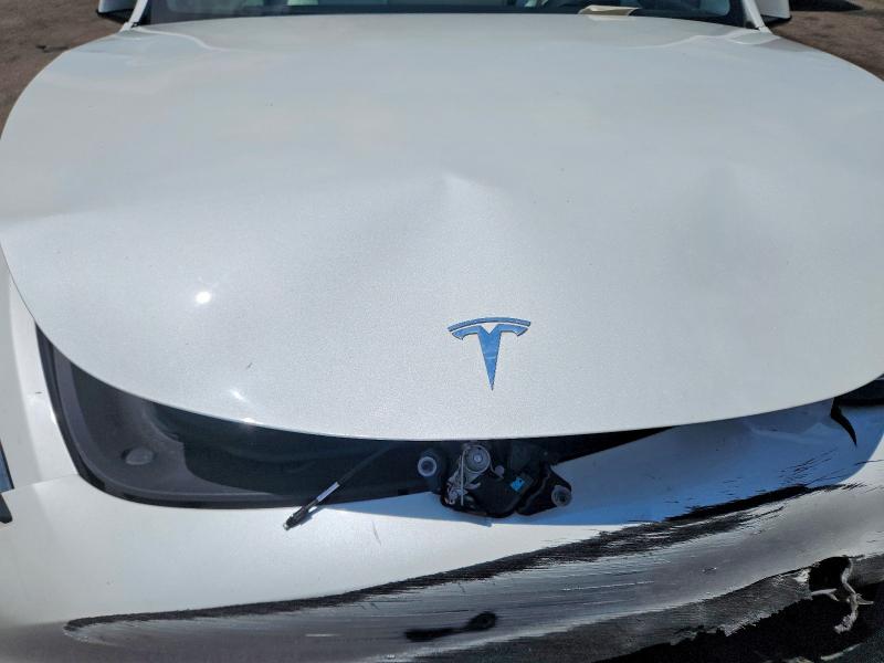 Photo 12 from auction – 2020 TESLA MODEL Y with VIN 5YJYGDEE5LF020972