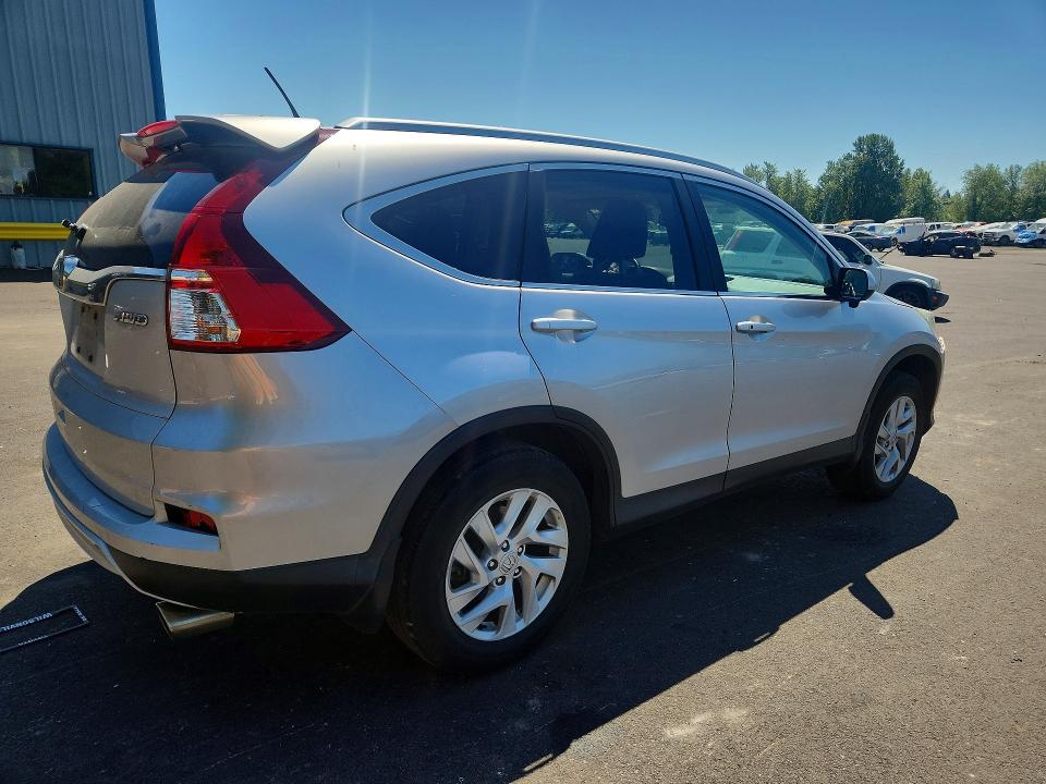 Photo 3 from auction – 2015 HONDA CR-V with VIN 2HKRM4H76FH608976