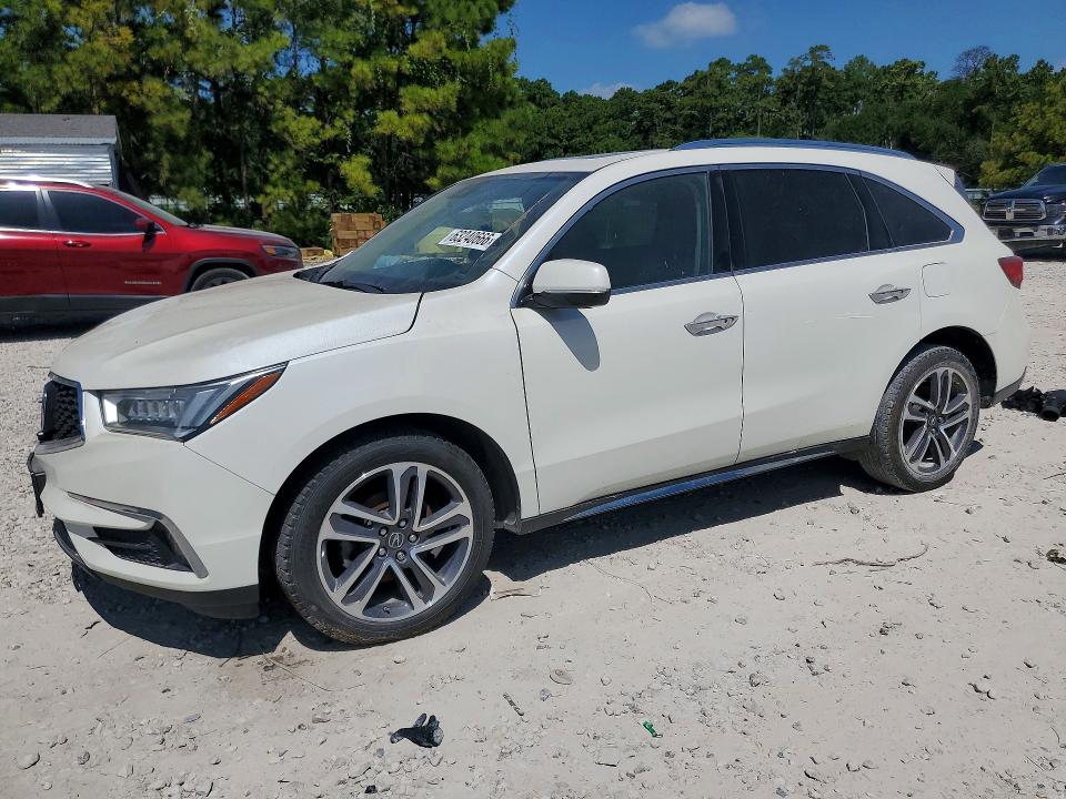 ACURA MDX 2017 con VIN 5FRYD3H91HB013394 - Foto de la subasta