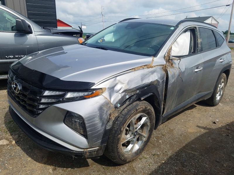 HYUNDAI TUCSON 2023 with VIN KM8JBCAE0PU215662 - Photo from auction