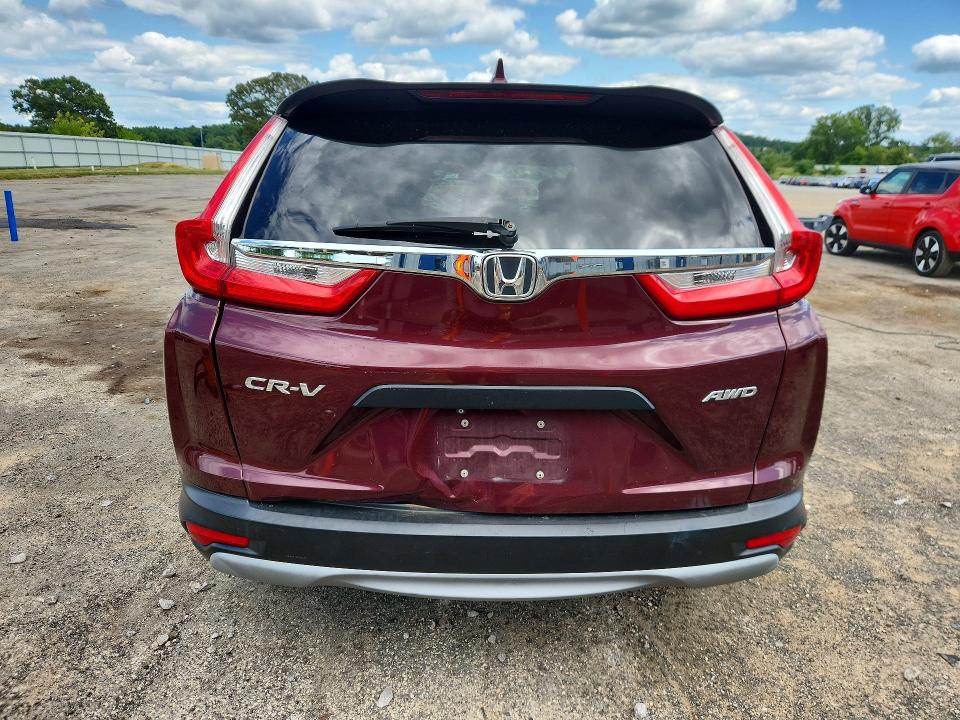 Photo 6 from auction – 2017 HONDA CR-V with VIN 5J6RW6H39HL001093