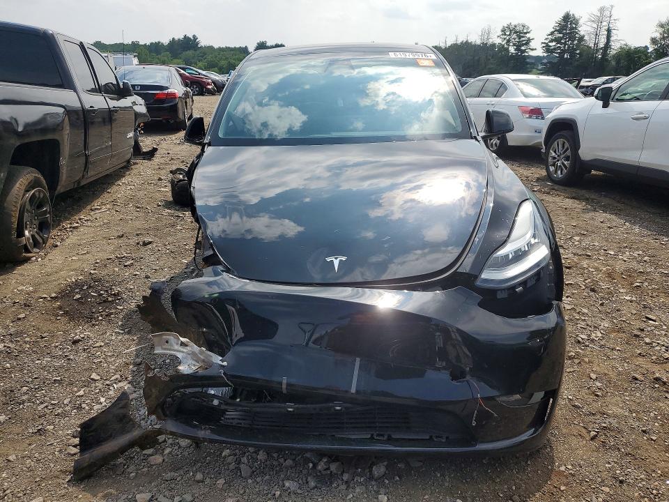 Photo 5 from auction – 2022 TESLA MODEL Y with VIN 7SAYGDEE3NA014980