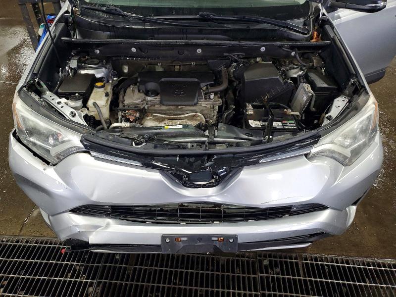 Photo 12 from auction – 2018 TOYOTA RAV4 with VIN 2T3RFREV4JW793637