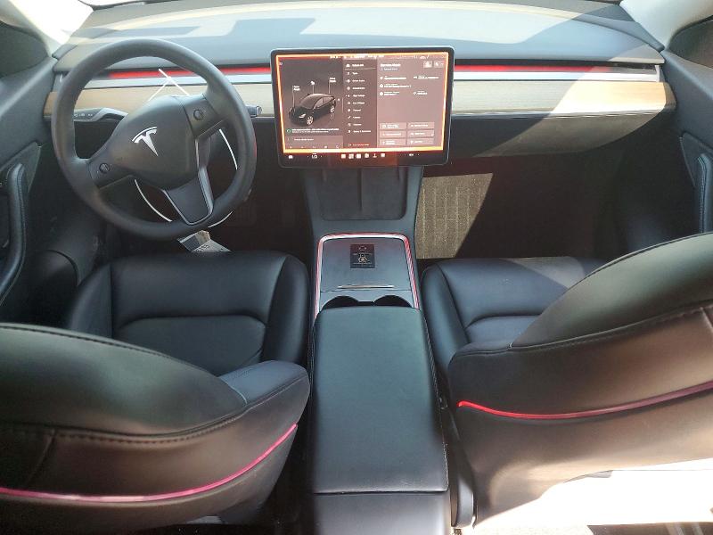 Снимка 8 от търг – 2022 TESLA MODEL Y с VIN 7SAYGDEE9NF422399