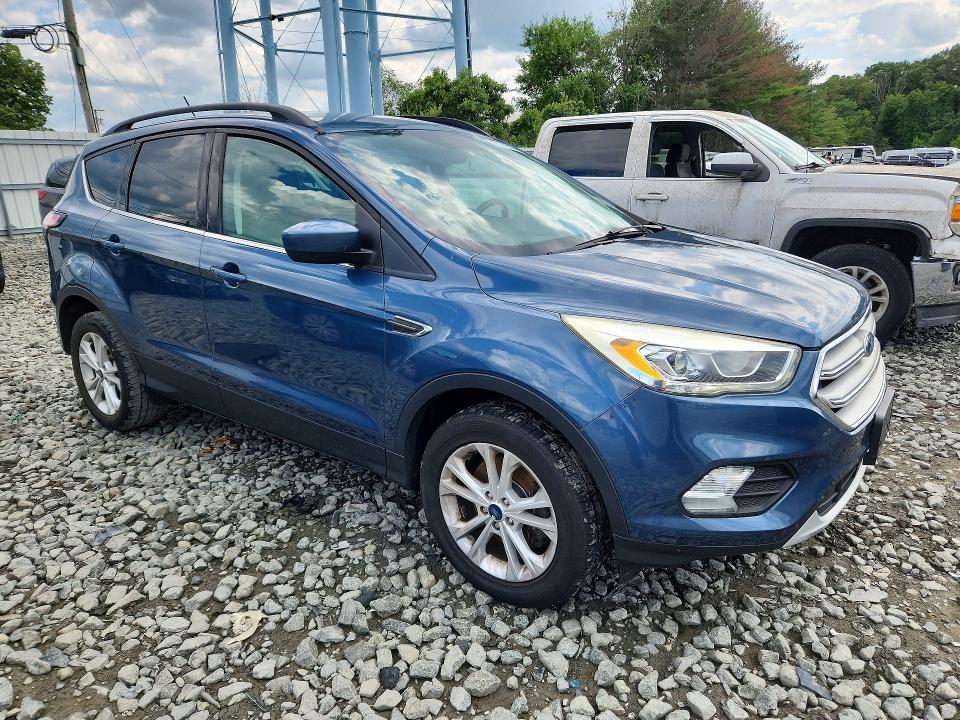 Photo 4 from auction – 2018 FORD ESCAPE with VIN 1FMCU9HD0JUB37068