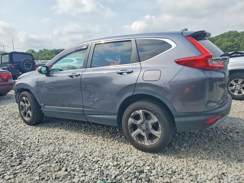 Photo 2 from auction – 2018 HONDA CR-V with VIN 7FARW2H5XJE093988