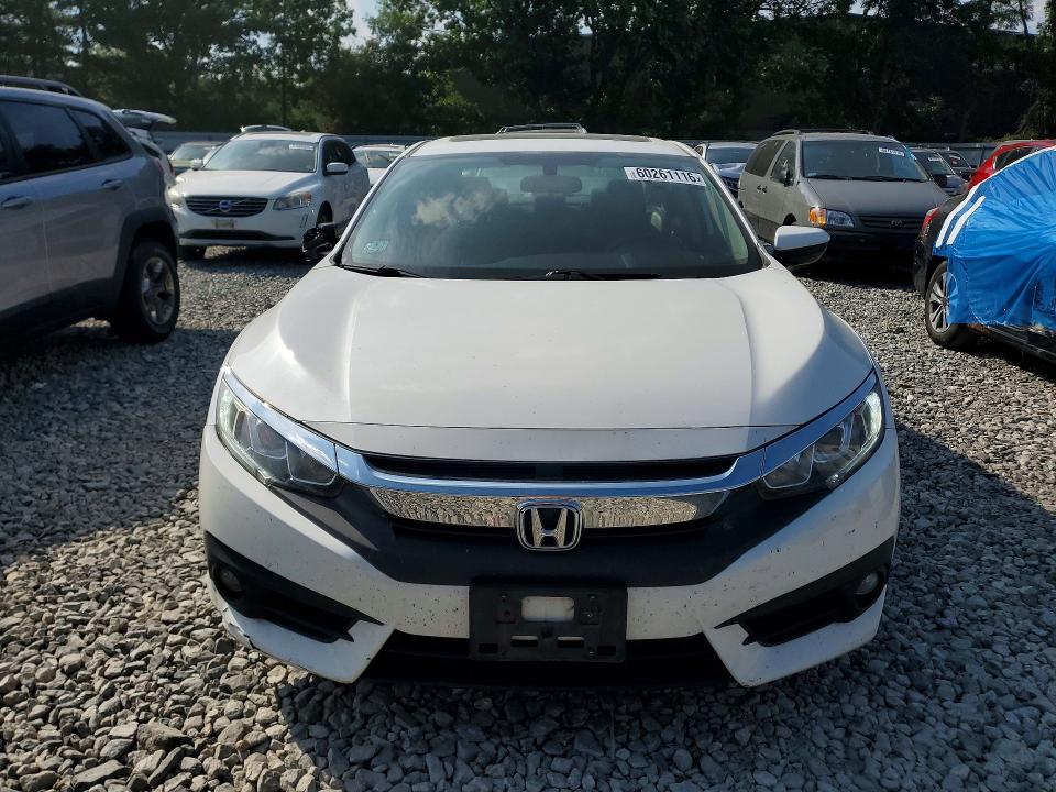 Photo 5 from auction – 2018 HONDA CIVIC with VIN 2HGFC1E34JH643248
