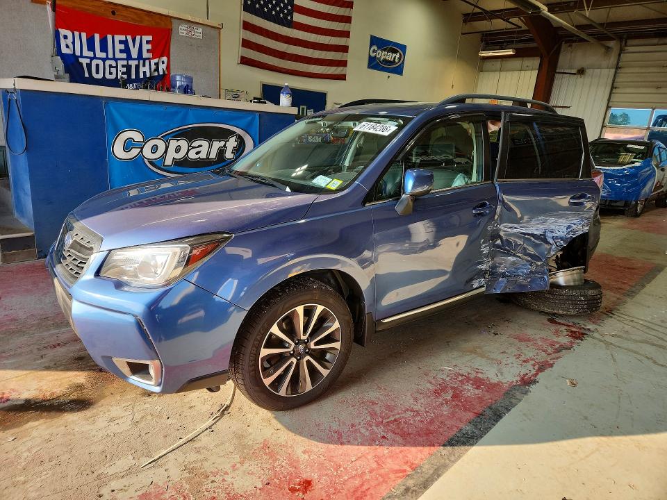 SUBARU FORESTER 2018 with VIN JF2SJGWC6JH559279 - Photo from auction