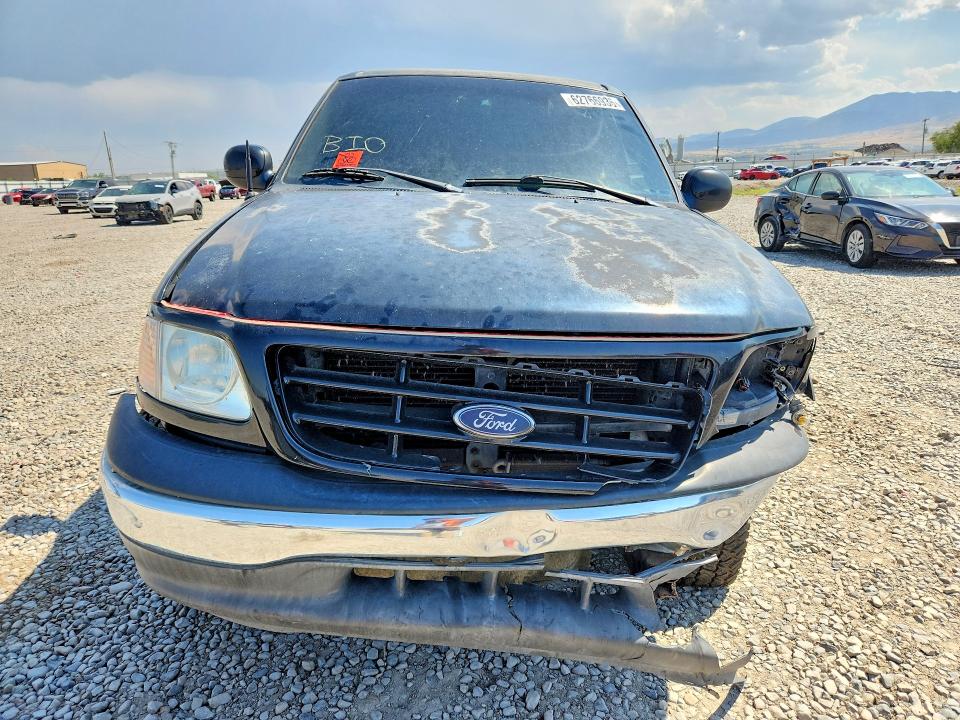 Photo 5 from auction – 2001 FORD F150 with VIN 1FTRW08L01KB55674