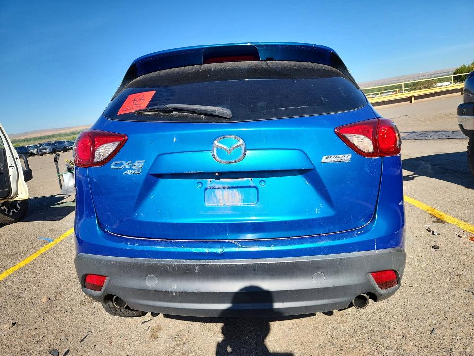 Photo 6 from auction – 2014 MAZDA CX-5 with VIN JM3KE4DY3E0303001