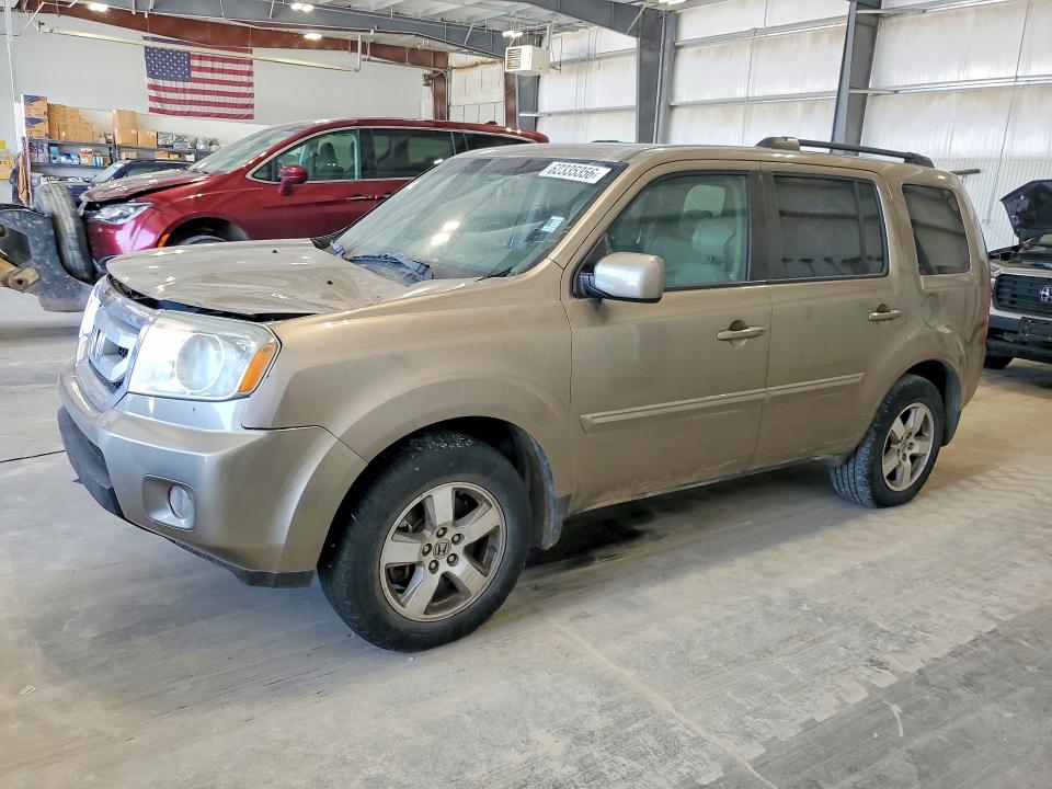 HONDA PILOT 2011 with VIN 5FNYF4H55BB026056 - Photo from auction